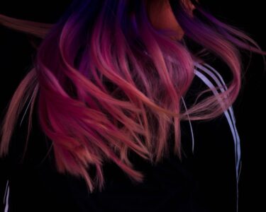 black hair with pink streaks