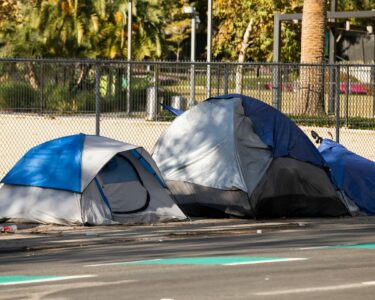 how to get rid of a homeless camp in my neighborhood