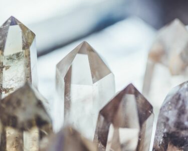 how is a quartz crystal not a solid or a liquid?