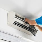 air conditioner blowing hot air inside and cold air outside